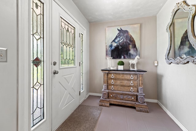 view of tiled foyer