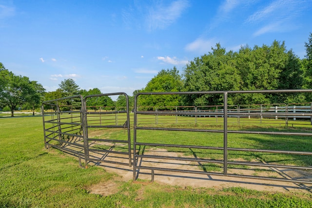 view of gate featuring a rural view