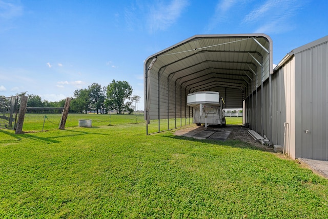 exterior space with a yard and a carport