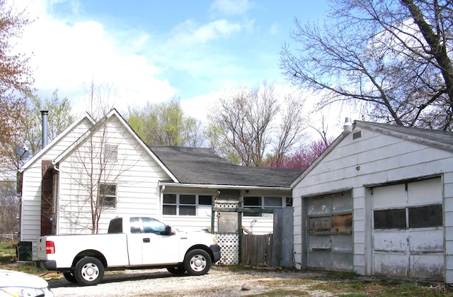 view of side of property with a garage