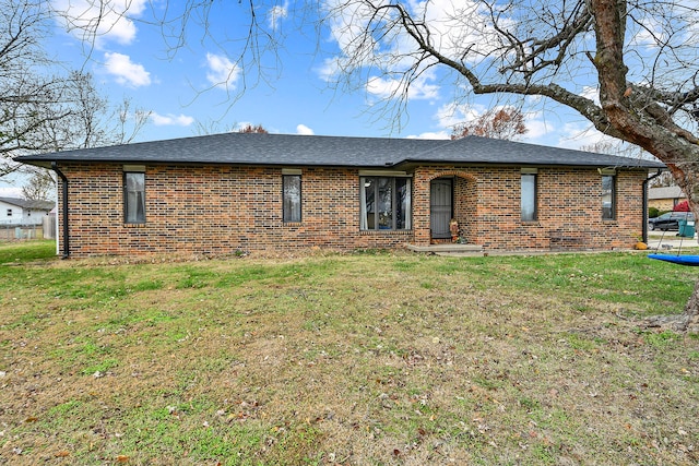 single story home with a front yard