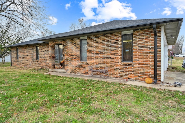 exterior space with a lawn