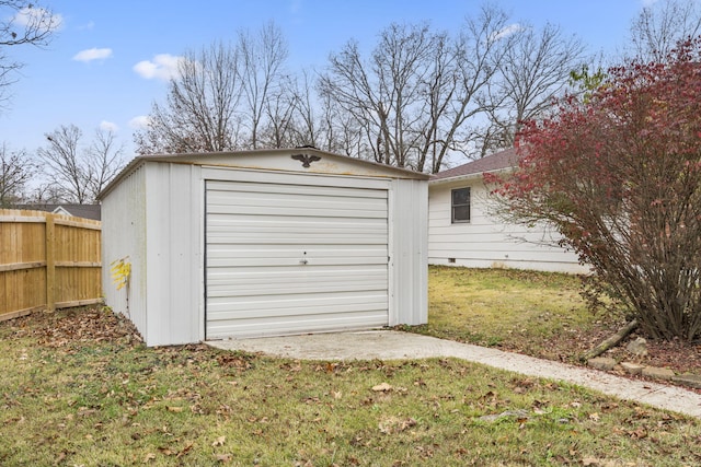 garage with a lawn