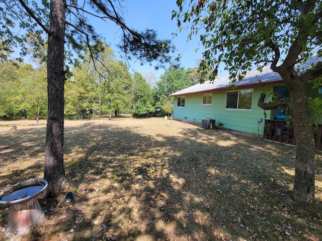 view of yard with central AC