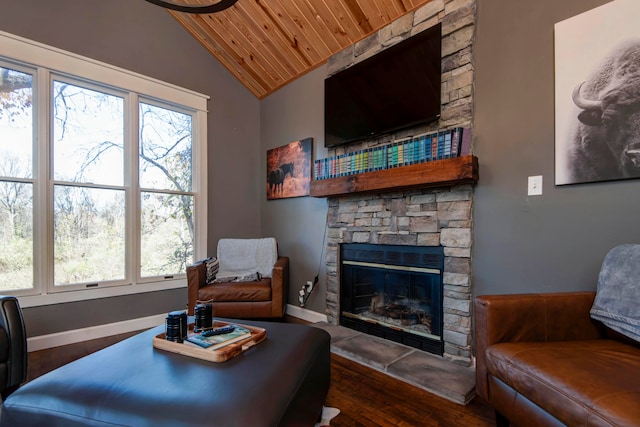 living room with a fireplace, dark hardwood / wood-style floors, vaulted ceiling, and wood ceiling