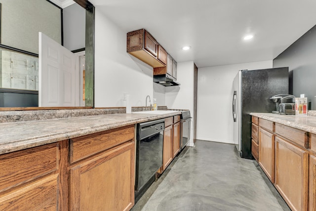 kitchen featuring sink, stainless steel fridge, black dishwasher, light stone counters, and range