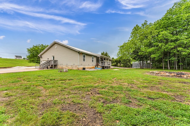 view of home's exterior featuring a lawn