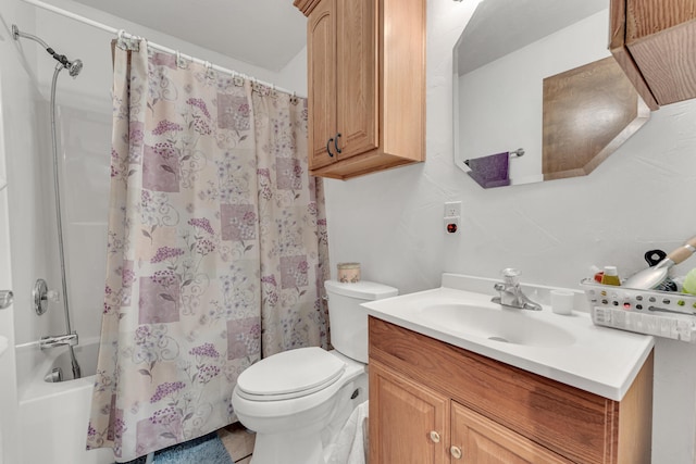 full bathroom with vanity, toilet, and shower / tub combo