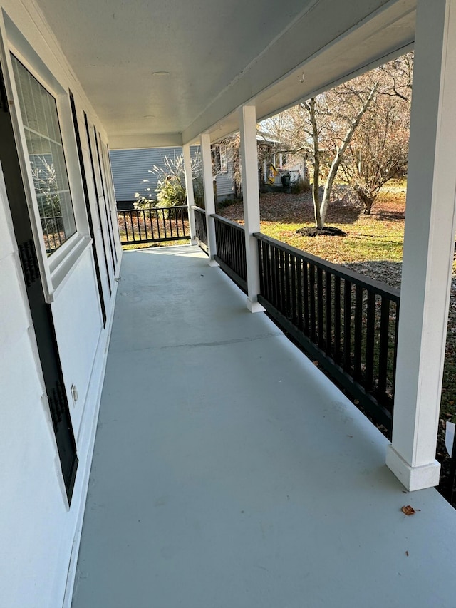 view of patio featuring a porch