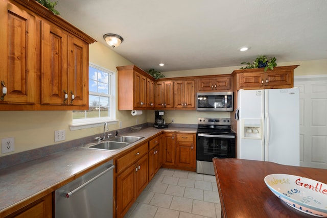 kitchen featuring stainless steel appliances and sink