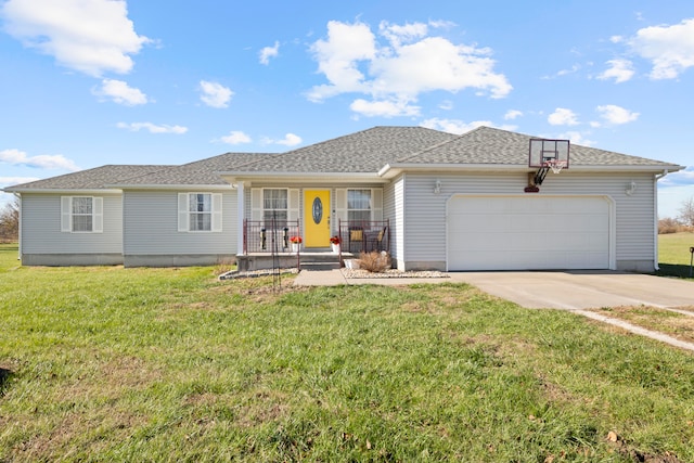 view of front facade featuring a front lawn and a garage