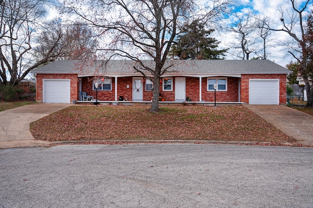 single story home featuring a garage