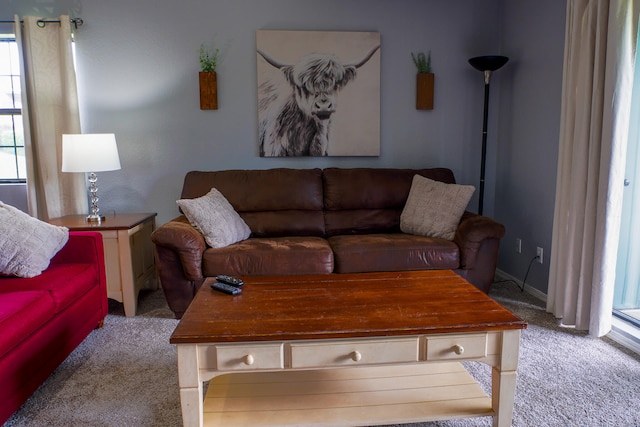 living room with light colored carpet