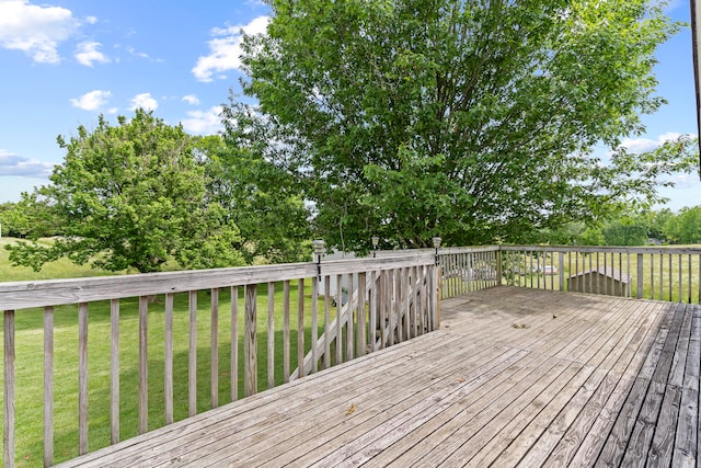 deck featuring a yard