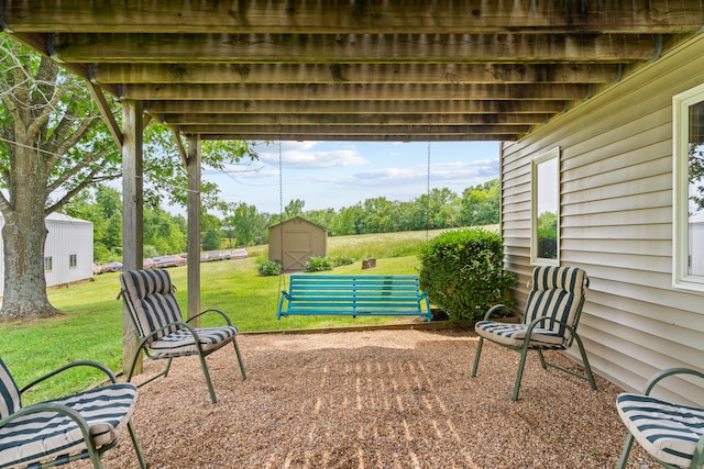 view of patio featuring a storage shed