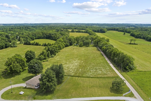 birds eye view of property featuring a rural view