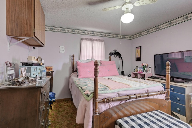 carpeted bedroom with a textured ceiling and ceiling fan