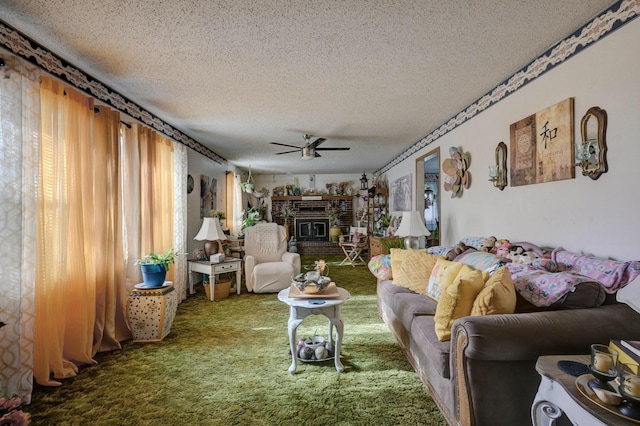 living room with carpet, a textured ceiling, a wood stove, and ceiling fan