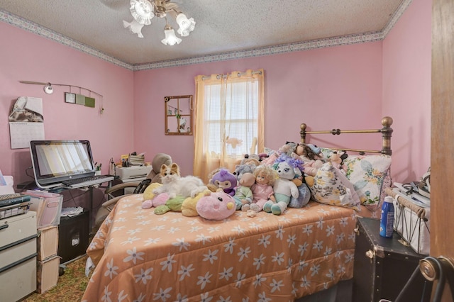 bedroom featuring a textured ceiling