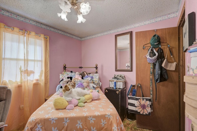 bedroom featuring a textured ceiling