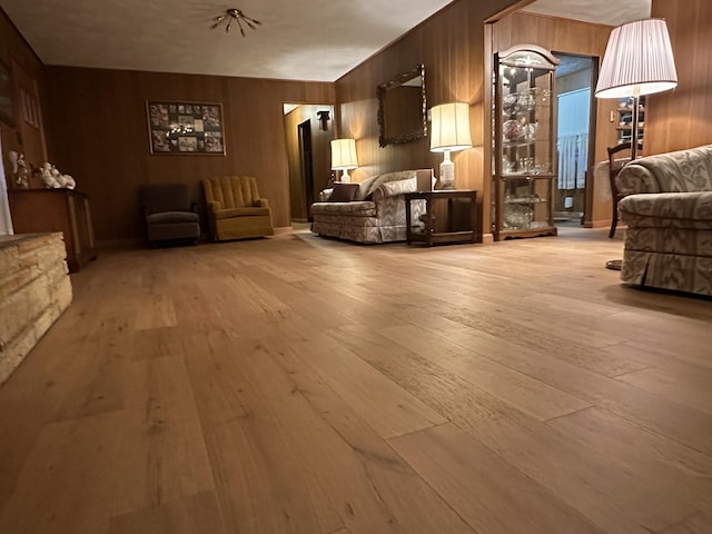 312 E Maple St, West Plains, MO 65775 - living room featuring wood walls and hardwood / wood-style floors