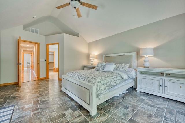 bedroom featuring vaulted ceiling and ceiling fan