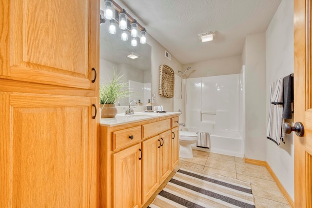 full bathroom featuring vanity, tile patterned flooring, a textured ceiling, toilet, and shower / bathing tub combination