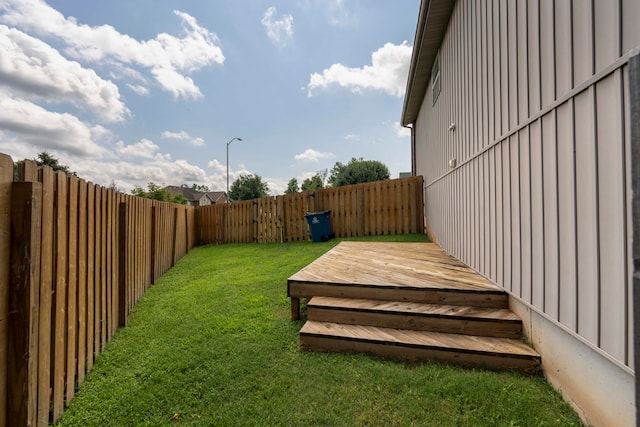 view of yard featuring a wooden deck