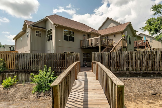 rear view of property with a deck