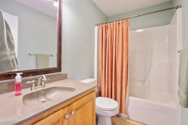 full bathroom with vanity, tile patterned floors, toilet, and shower / tub combo with curtain