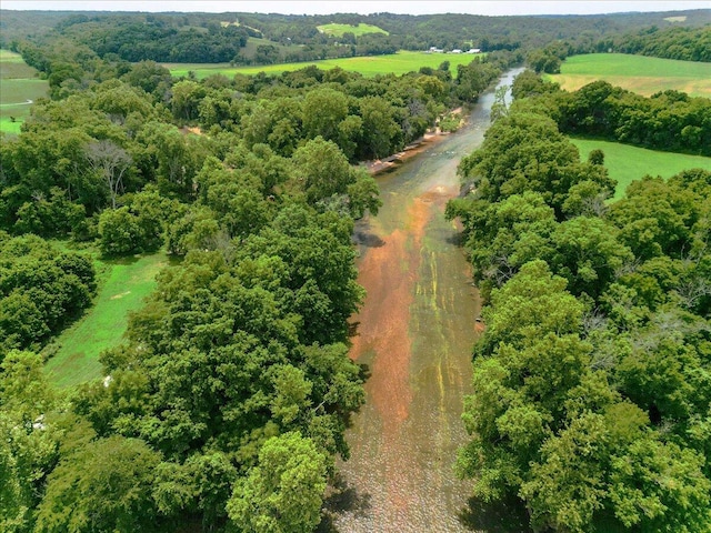 birds eye view of property with a rural view