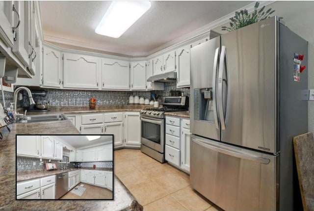 kitchen with backsplash, sink, white cabinets, and stainless steel appliances