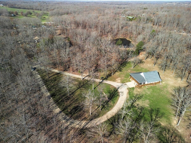 birds eye view of property with a rural view