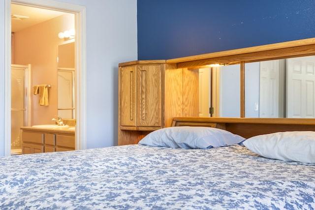 474 Woodland Dr E, Branson, MO 65616 - bedroom with ensuite bathroom