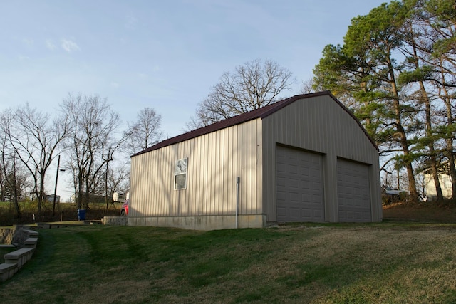 garage with a yard