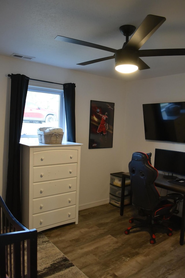 office space with ceiling fan and hardwood / wood-style floors