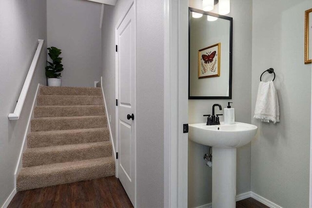 bathroom featuring hardwood / wood-style flooring and sink