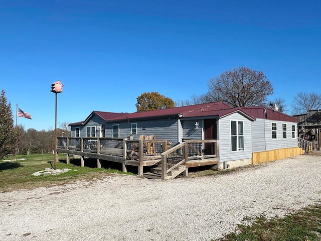 exterior space featuring a deck