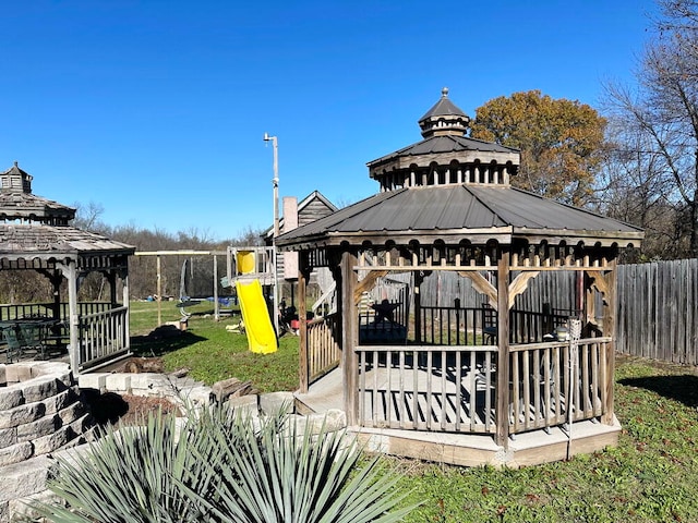 exterior space featuring a gazebo and a playground