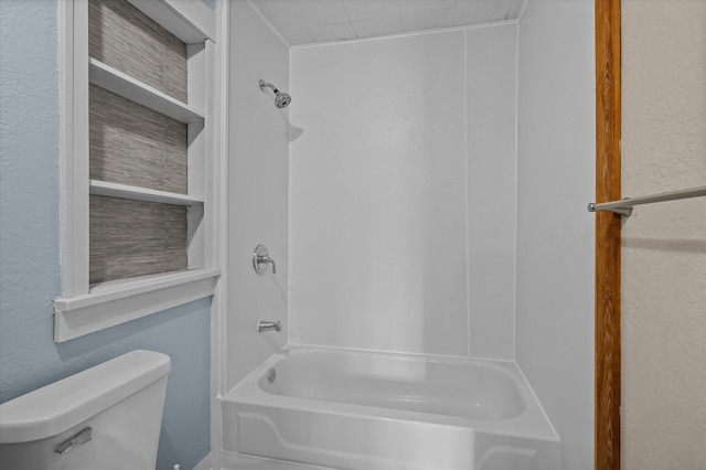 bathroom with toilet and shower / washtub combination