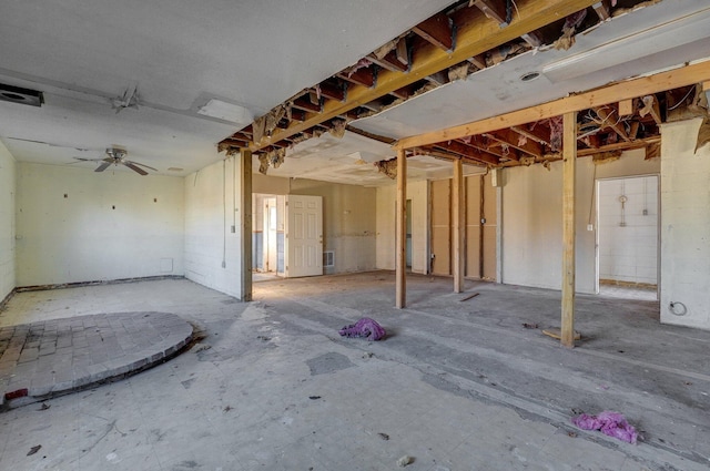 basement featuring ceiling fan