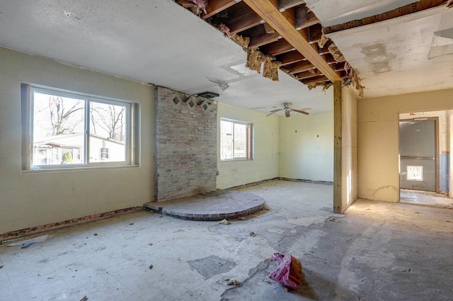 418 S Elm St, Mountain Grove, MO 65711 - unfurnished living room with a ceiling fan