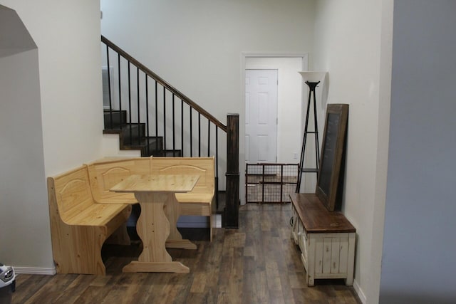 stairway featuring wood-type flooring