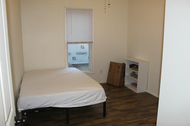 bedroom featuring dark hardwood / wood-style floors