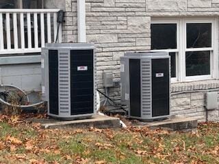 doorway to property with central air condition unit