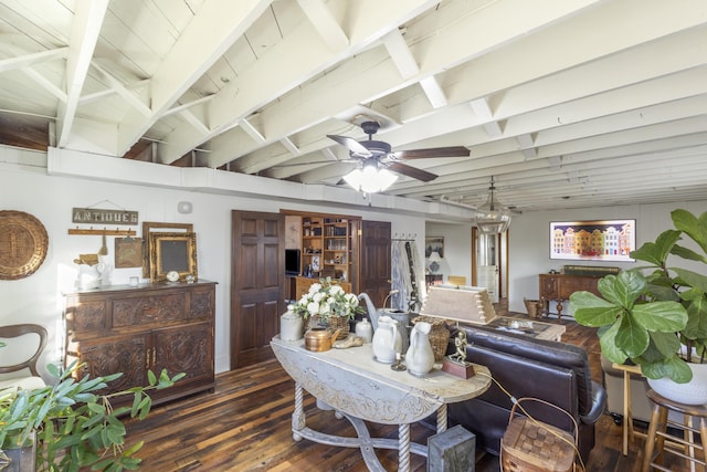 dining space with ceiling fan, dark wood-type flooring, and lofted ceiling with beams