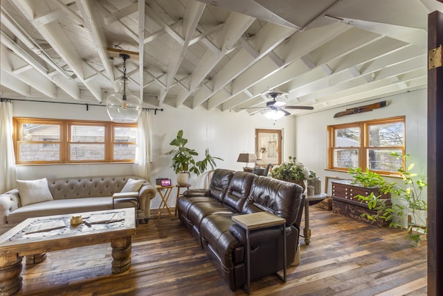 living room with ceiling fan and dark wood-type flooring