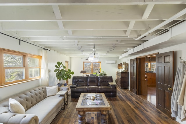 living room with ceiling fan, dark wood-type flooring, and a wall unit AC