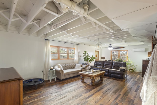 living room with vaulted ceiling, ceiling fan, a wall unit AC, and dark hardwood / wood-style floors