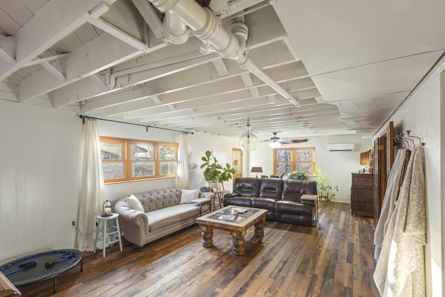 living room featuring ceiling fan, dark wood-type flooring, and a wall mounted AC